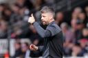 Buddies boss Stephen Robinson praised his players for securing a place in the top half of the league