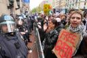 Demonstrators chant slogans outside the Columbia University campus (AP)
