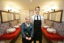 Staff members Eilish Cole and James Garner in the Loo of the Year