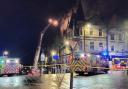 999 crews battle blaze at building close to busy high street