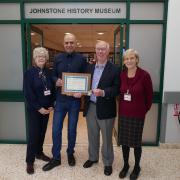 Tabassum Shafiq with Johnstone History Society chairman Iain Murray and museum volunteers Marlene Rogan (left) and Helen Bowie