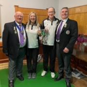 Winners Ian Whyte and Gaynor Taylor with Paisley and District Indoor Bowling Association president John Deans and past president Kenny Moore
