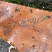 Vandalised bench located on Clyde Walkway in Renfrew