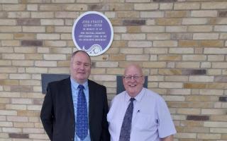 Councillors John Hood and Andy Doig next to the plaque honouring John Fraser