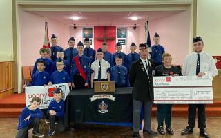 Members of 3rd Johnstone Boys' Brigade Company with Donna Armstrong, of Poppyscotland