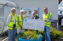 (left to right) Linda Megson, Elizabeth Cox, Allison Devine and Councillor James MacLaren with a £300 donation from the Co-op and next to the special planter