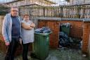 Fiona Wilson and her neighbour John Rosling at the overflowing bins in Buchanan Way, Johnstone