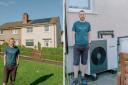 Michael McEwan next to home with solar panels and heat pump