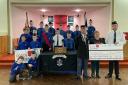 Members of 3rd Johnstone Boys' Brigade Company with Donna Armstrong, of Poppyscotland