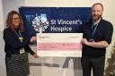 Susan McCallum, director of care and quality, and Raymond England, trusts and foundations manager, both of St Vincent’s Hospice with a presentation cheque from the National Lottery Community Fund