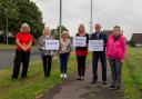 Residents at a previous protest against plans to erect the 5G mast