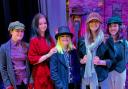 Some of the young performers from Oliver! take a bow