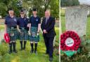 Three members of Kilbarchan Pipe Band and Minister for Veterans Graeme Dey visited the grave of Kilbarchan scout William Dunne