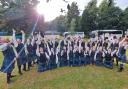 Renfrewshire Schools Pipe Band celebrate their victory at the Scottish Pipe Band Championships 2023