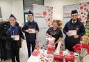 Youngsters from 3rd Johnstone Boys' Brigade Company with Donna Armstrong, of Poppyscotland, at the town's Morrisons store