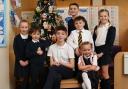 Kilbarchan primary school pupils, pictured from left - Rebecca McKenzie, Oliver Morrison, Rachel Byrne, Innes Stevenson (standing at back), Rory Shaw (white shirt and tie), Anna-Katerina Westbrook and Myla McNaughton (standing at right)