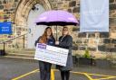 Memoria Manager Katrina Johnston met with Erskine’s Caitlin Brown to present the charity with the funds