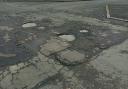 Councillor pledges to 'keep an eye' on pothole-ridden road after repairs made
