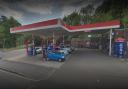 Hunt for men who racially abused petrol station worker