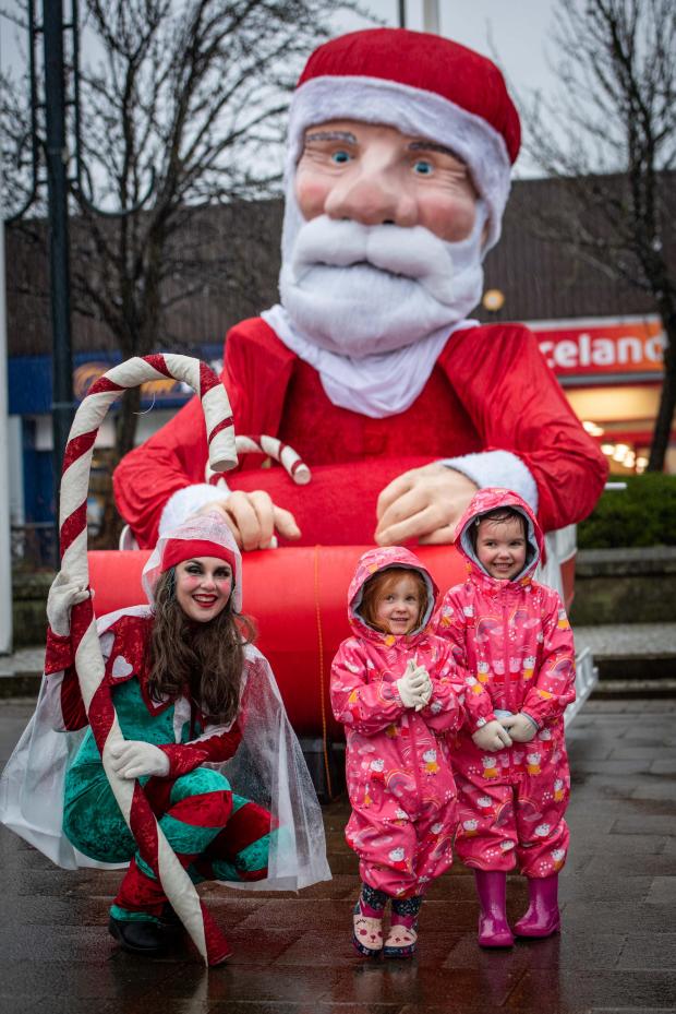 The Gazette: Hailee and Sophia Miller, from the Ralston area of Paisley, were excited to talk to Santa's helper
