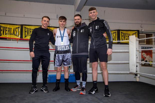 The Gazette: In the ring with coaches Sam Wylie (left) and Graeme Hamilton and friend Finlay Brown