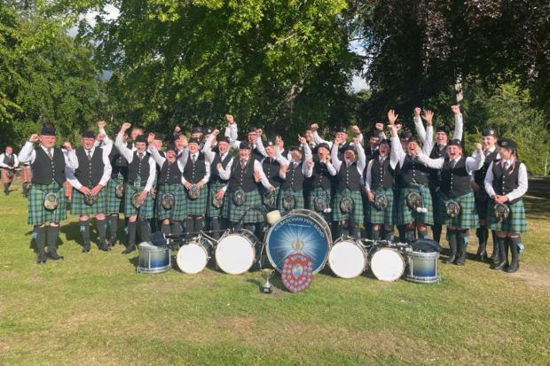 Talented members of Kilbarchan Pipe Band celebrate their latest win