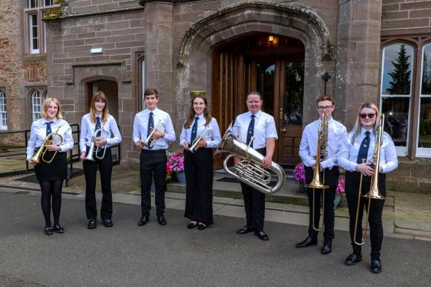 Musicians blow their own trumpet after lessons at brass band school