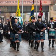 Pipers and military personnel paraded around Paisley town centre