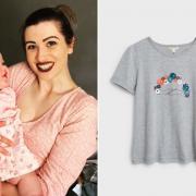 Laura Ross with her baby Jaina and the T-shirt she designed