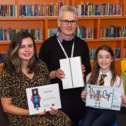 Design a Robot contest winner Marnie Dickson (right) with Rebecca McFarlane, of Altrad Babcock, and Andrew Givan, OneRen's children and young people co-ordinator