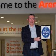 Braehead Arena managing director Gareth Chalmers with the award