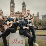 Scottish musician Robert Robertson, Gaelic and Scots singer and d/Deaf performer Evie Waddell with young musicians Emma Loney and Luke McIntosh