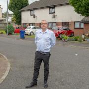 Councillor Iain McMillan in Swallow Drive