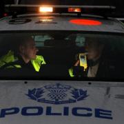Man being given breath test stock pic