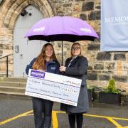 Memoria Manager Katrina Johnston met with Erskine’s Caitlin Brown to present the charity with the funds