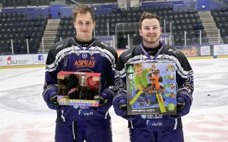 Glasgow Clan players Reid Petryk (left) and Gary Haden getting ready for the Friday's toy collection